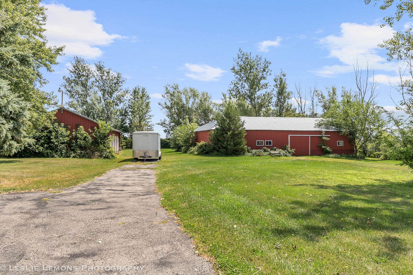 16276 Willrett Road Malta, IL 60150 - Photo 22 of 25 a front view of a house with garden