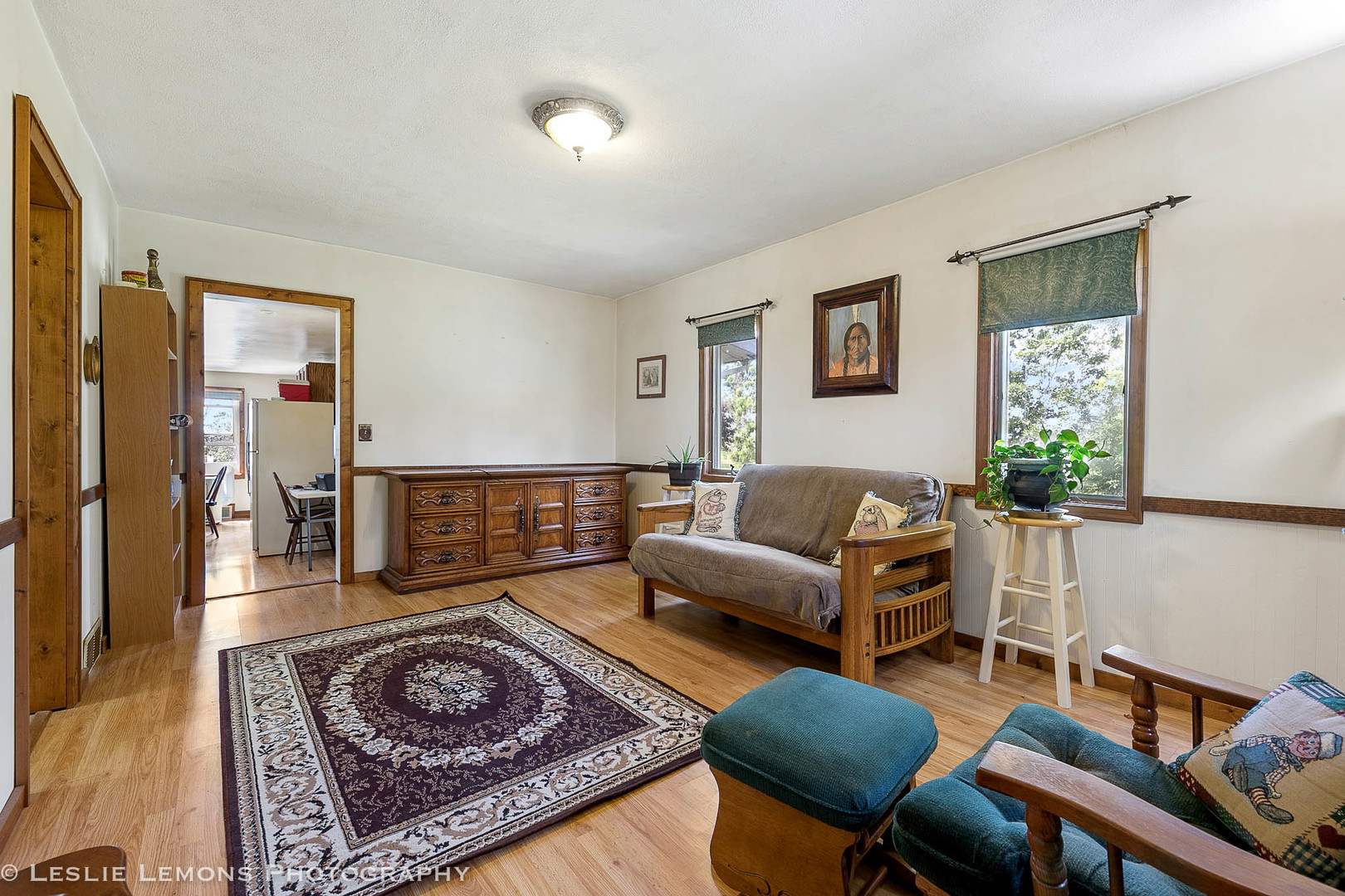 16276 Willrett Road Malta, IL 60150 - Photo 4 of 25 a living room with furniture rug and wooden floor