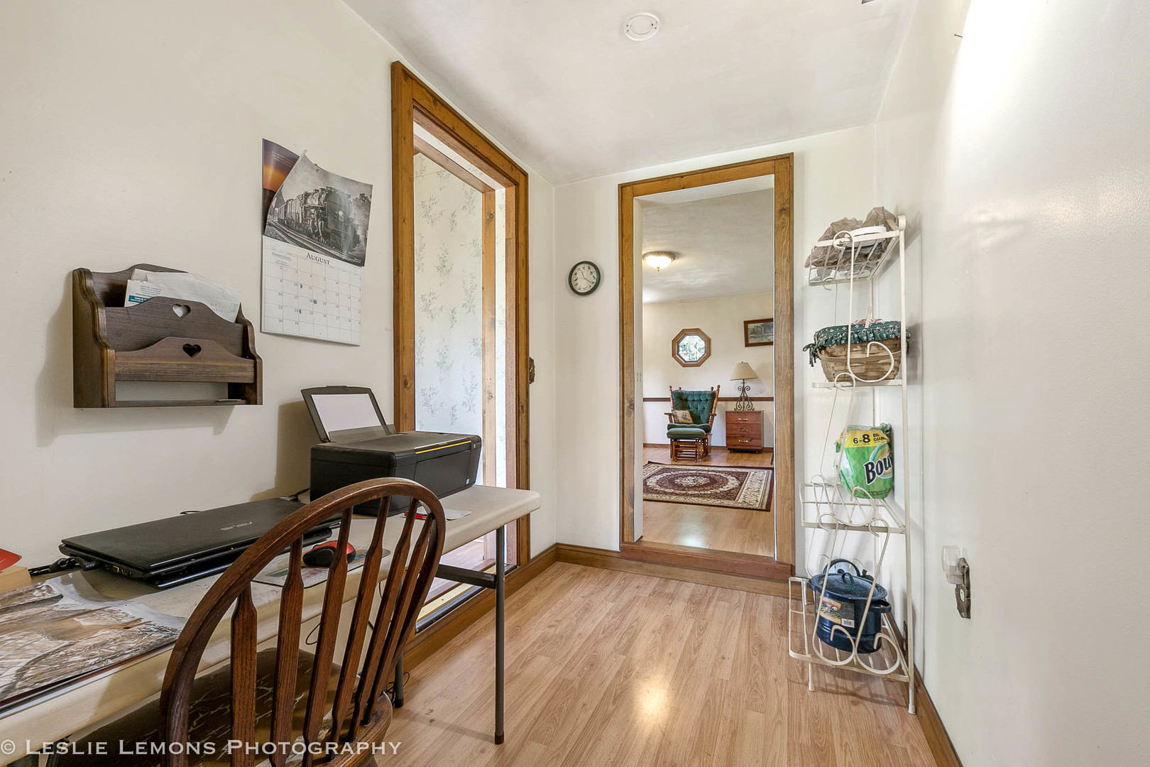 16276 Willrett Road Malta, IL 60150 - Photo 5 of 25 a view of a workspace with furniture and wooden floor