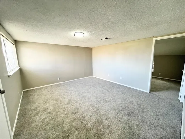 an empty room with a natural light