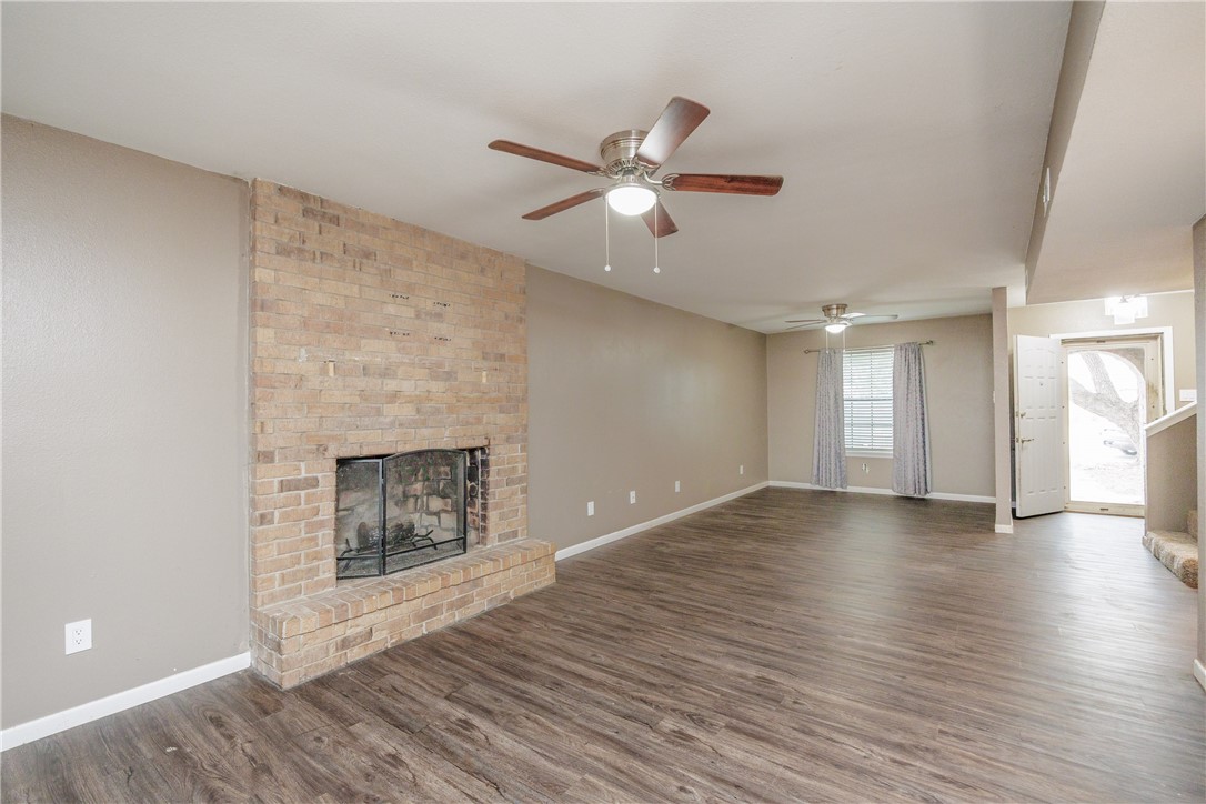 320 Long Point Drive Portland, TX 78374 - Photo 7 of 40 Large windows and a glass-paneled front door allow