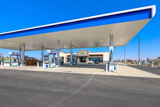 a view of swimming pool with outdoor seating
