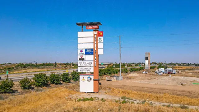 a view of street with shops