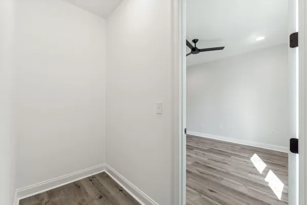 a view of small space with wooden floor