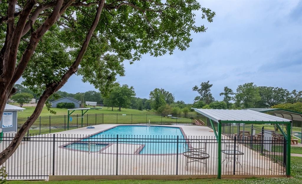 164 Geronimo Quitman, TX 75783 - Photo 12 of 18 a view of a tennis court