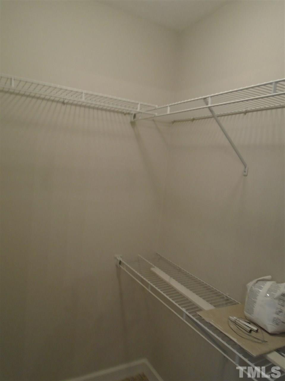 3241 Banks Road Raleigh, NC 27603 - Photo 12 of 19 a view of a room with racks on the wall