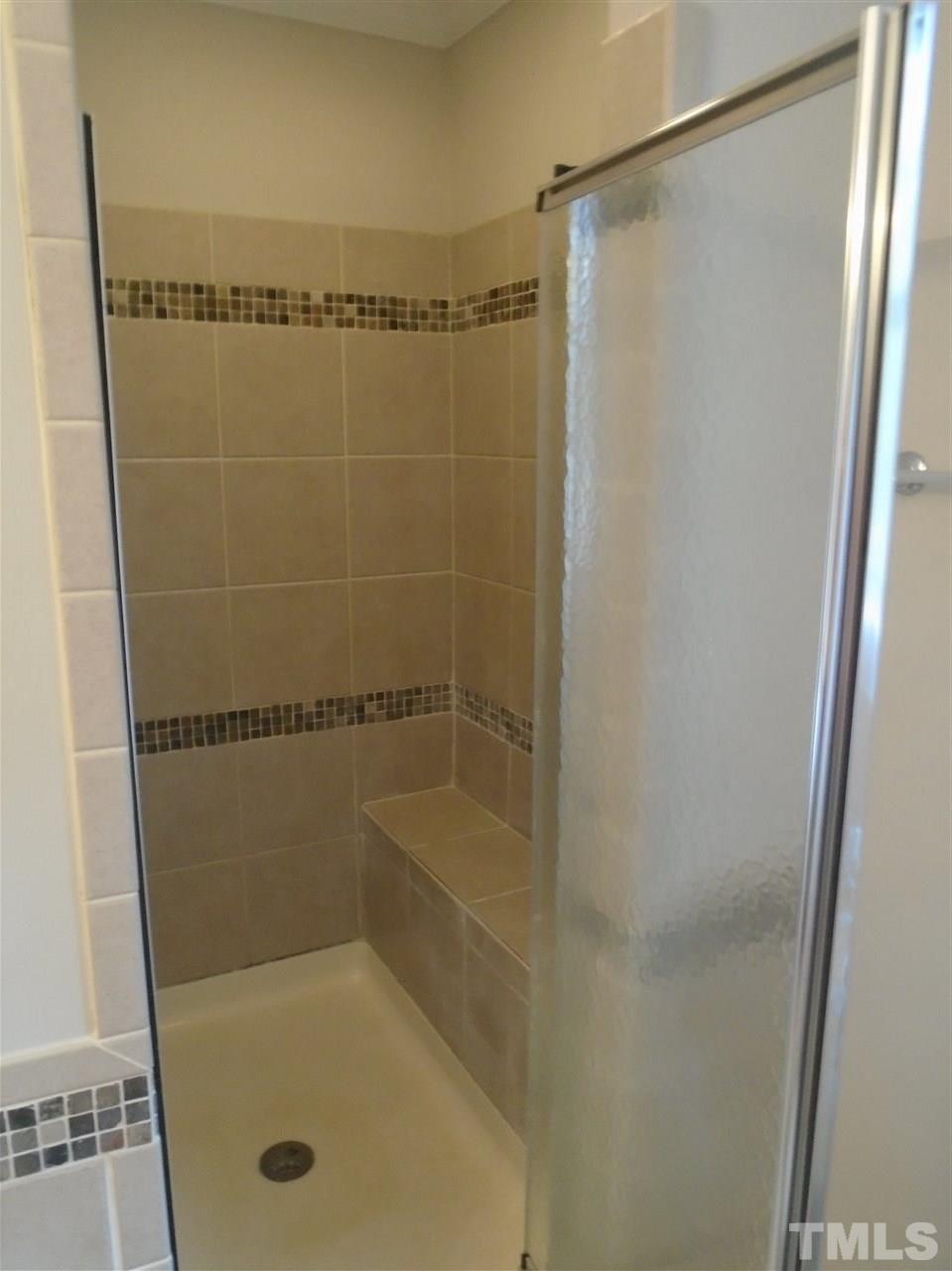 3241 Banks Road Raleigh, NC 27603 - Photo 13 of 19 a bathroom with a shower