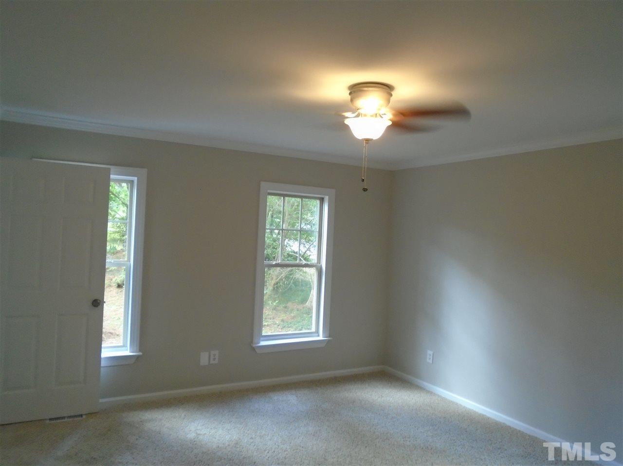 3241 Banks Road Raleigh, NC 27603 - Photo 14 of 19 an empty room with a window