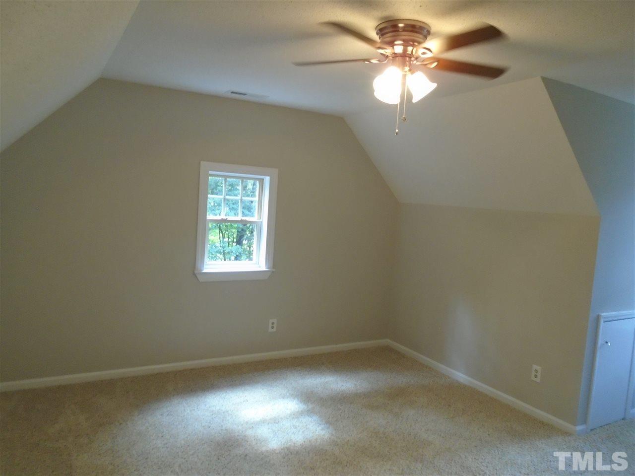 3241 Banks Road Raleigh, NC 27603 - Photo 16 of 19 an empty room with a window and a fan