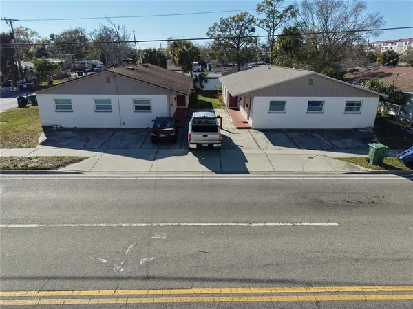a aerial view of a house with a garden
