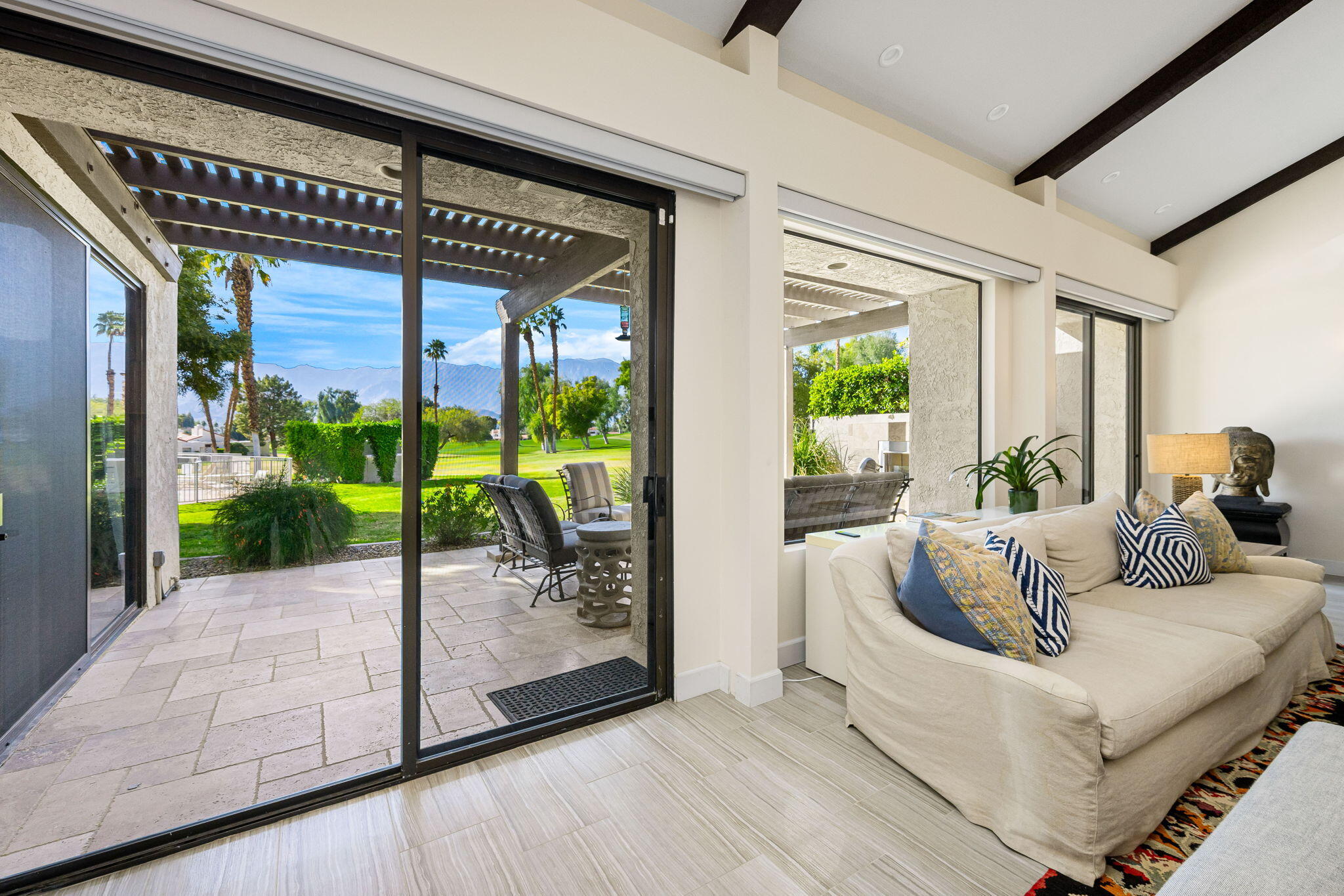 730 Inverness Drive Rancho Mirage, CA 92270 - Photo 15 of 42 Sliding door to back patio