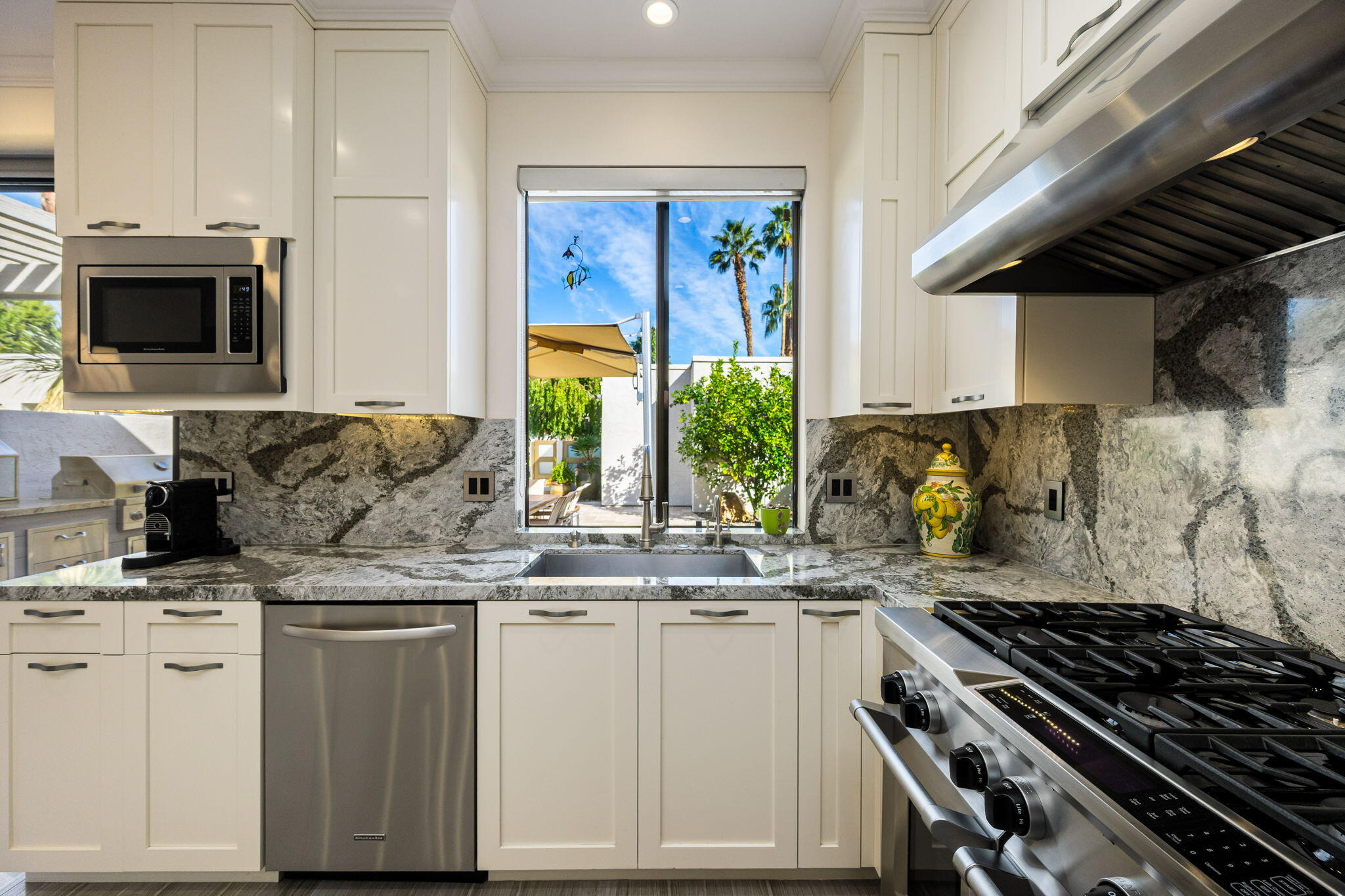 730 Inverness Drive Rancho Mirage, CA 92270 - Photo 17 of 42 Kitchen View to Courtyard