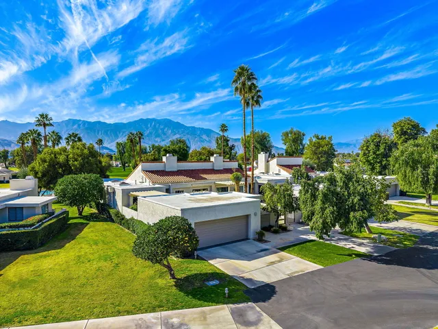 a view of a swimming pool with a garden