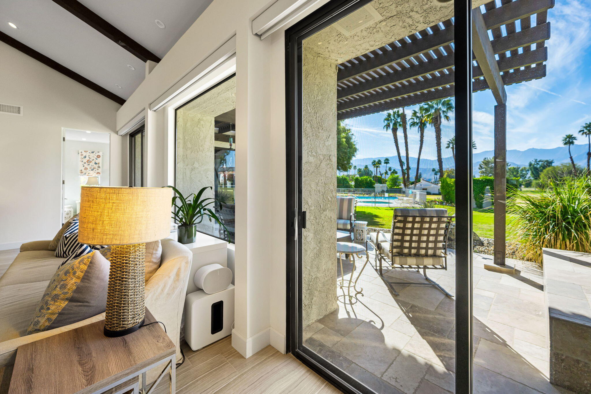 730 Inverness Drive Rancho Mirage, CA 92270 - Photo 33 of 42 Living Room to back patio
