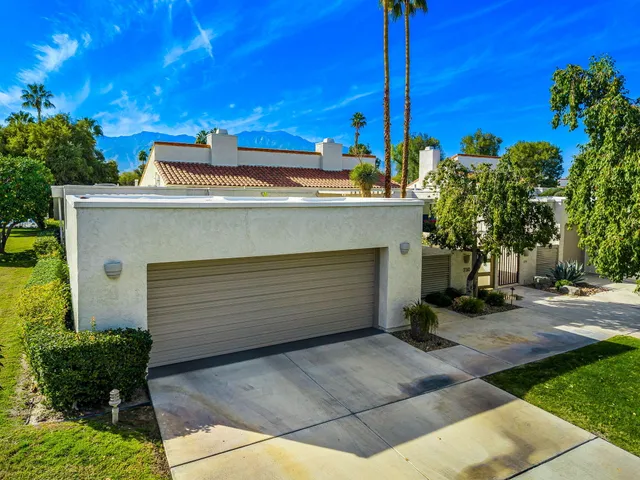 a view of a house with a garage