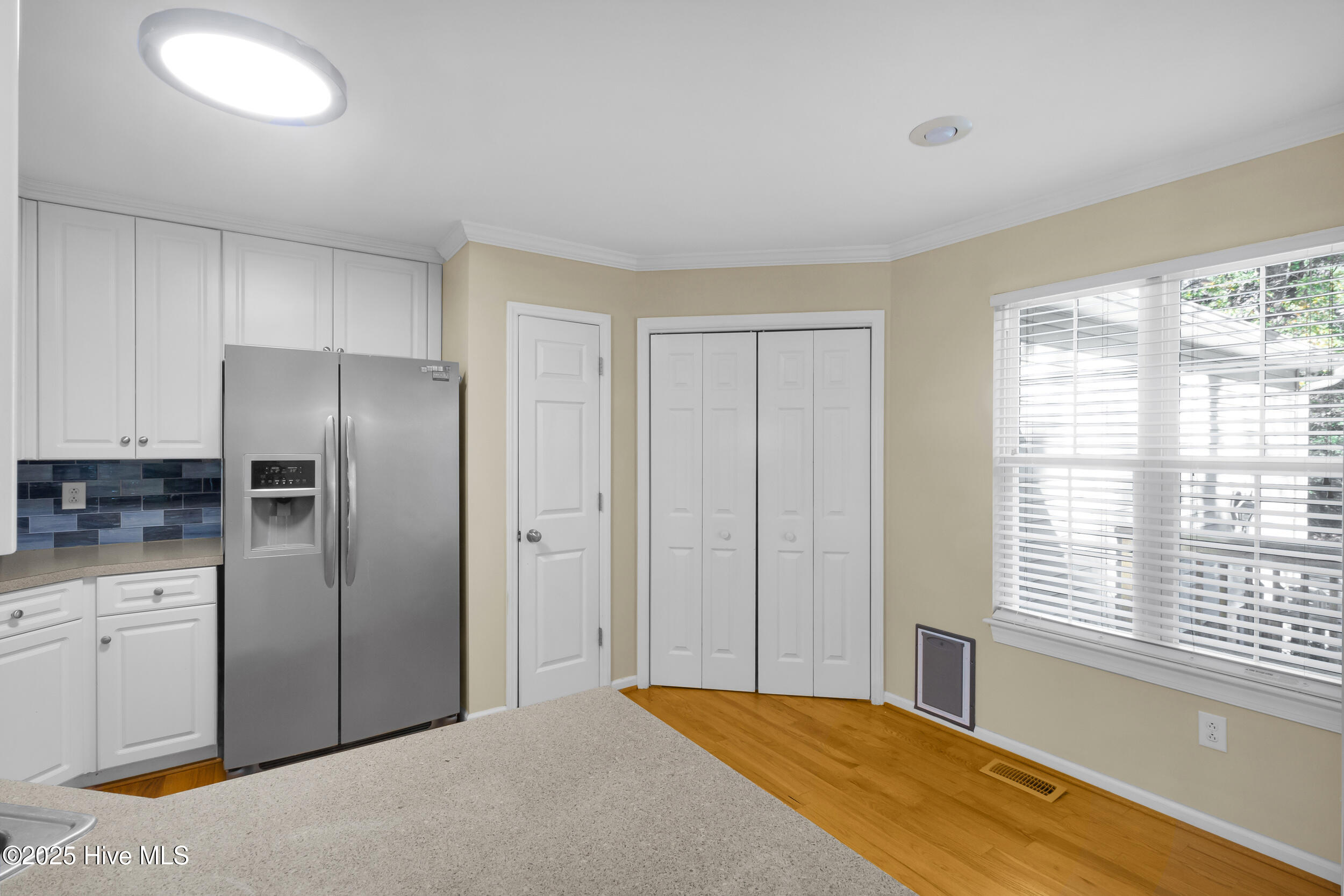 916 Buckingham Road New Bern, NC 28562 - Photo 10 of 35 Kitchen to laundry room and finished room over garage