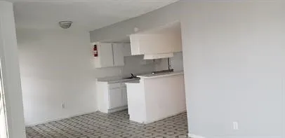 a room with a storage and utility