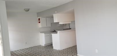 8445 Winkler Drive, Unit 11 Houston, TX 77017 - Photo 3 of 6 a room with a storage and utility