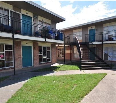 8445 Winkler Drive, Unit 11 Houston, TX 77017 - Photo 4 of 6 a front view of a house with garden