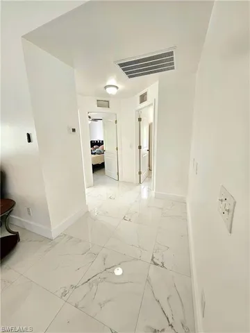 a view of a backyard with a swimming pool