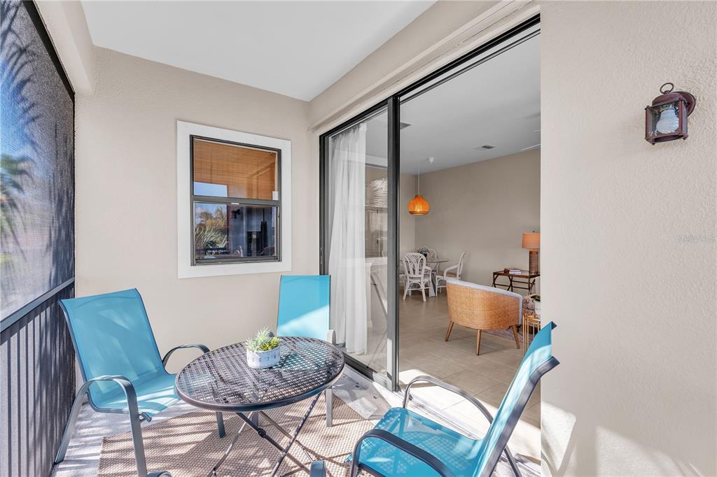 7250 Hamilton Road, Unit 7250 Bradenton, FL 34209 - Photo 14 of 34 a living room with furniture and a potted plant
