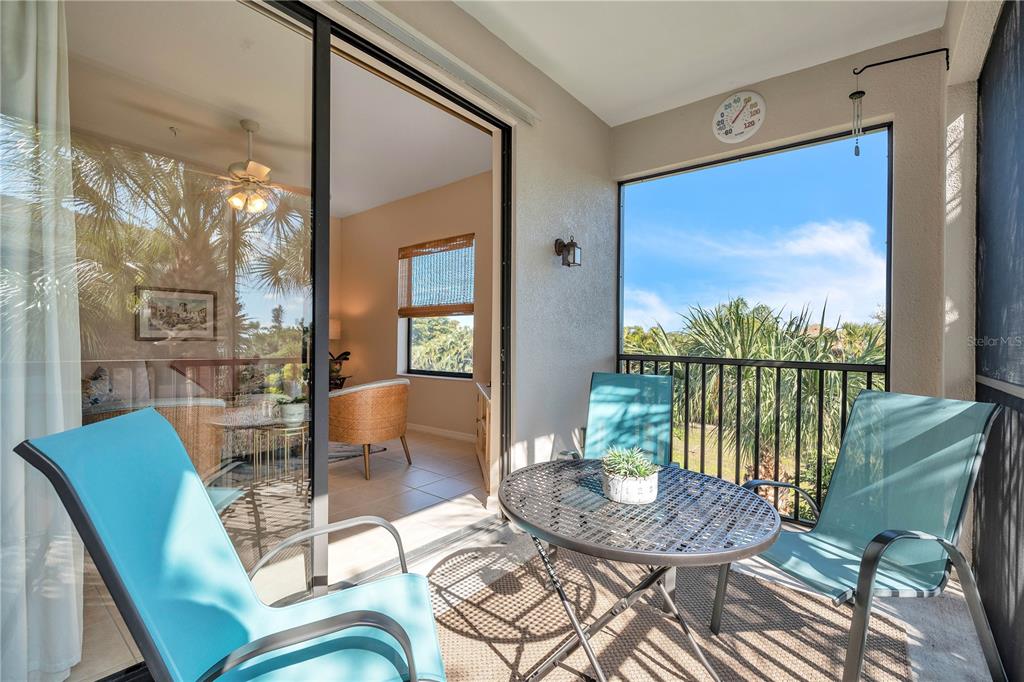 7250 Hamilton Road, Unit 7250 Bradenton, FL 34209 - Photo 15 of 34 a view of a livingroom with furniture window and wooden floor