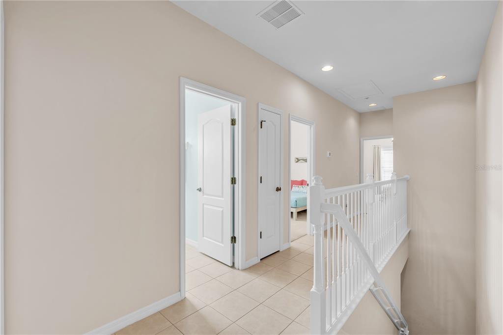 7250 Hamilton Road, Unit 7250 Bradenton, FL 34209 - Photo 3 of 34 a view of a hallway with wooden floor and entryway