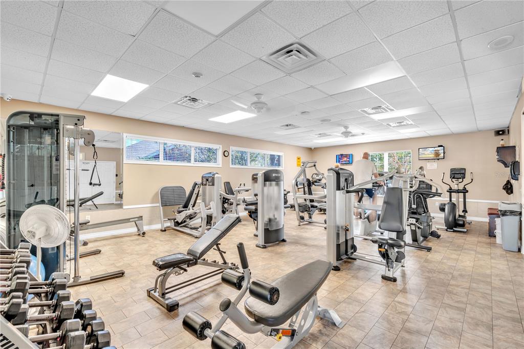 7250 Hamilton Road, Unit 7250 Bradenton, FL 34209 - Photo 33 of 34 a view of a room with gym equipment