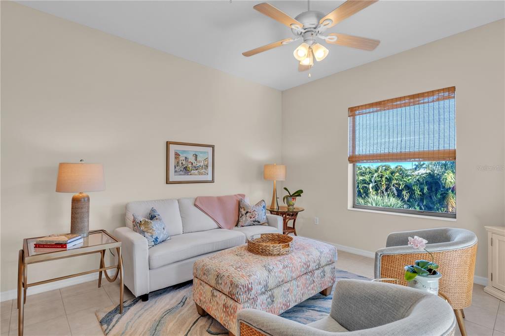 7250 Hamilton Road, Unit 7250 Bradenton, FL 34209 - Photo 4 of 34 a living room with furniture and a window