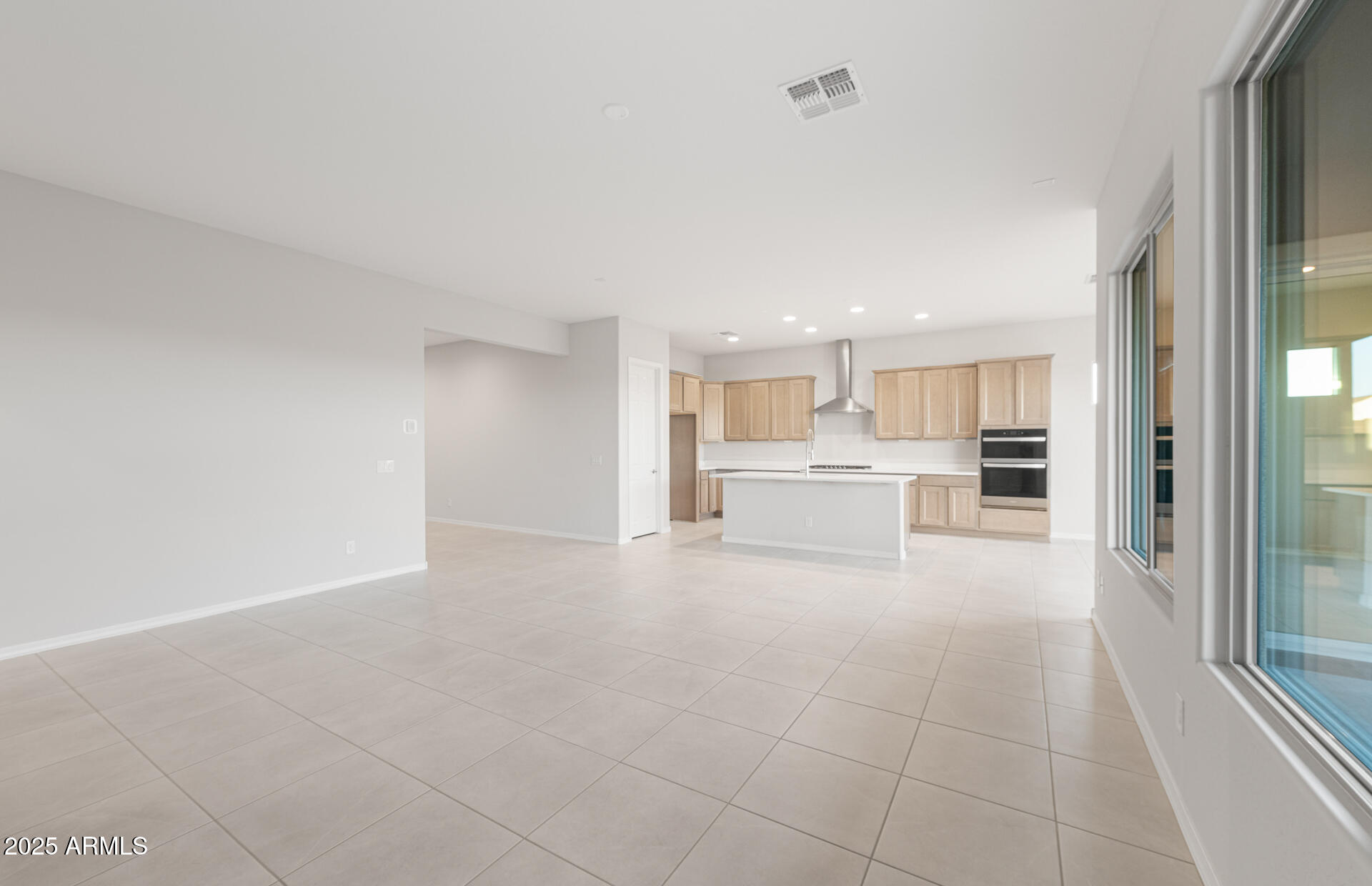 16170 West Red Bird Road Surprise, AZ 85387 - Photo 10 of 27 a view of large kitchen with white cabinets