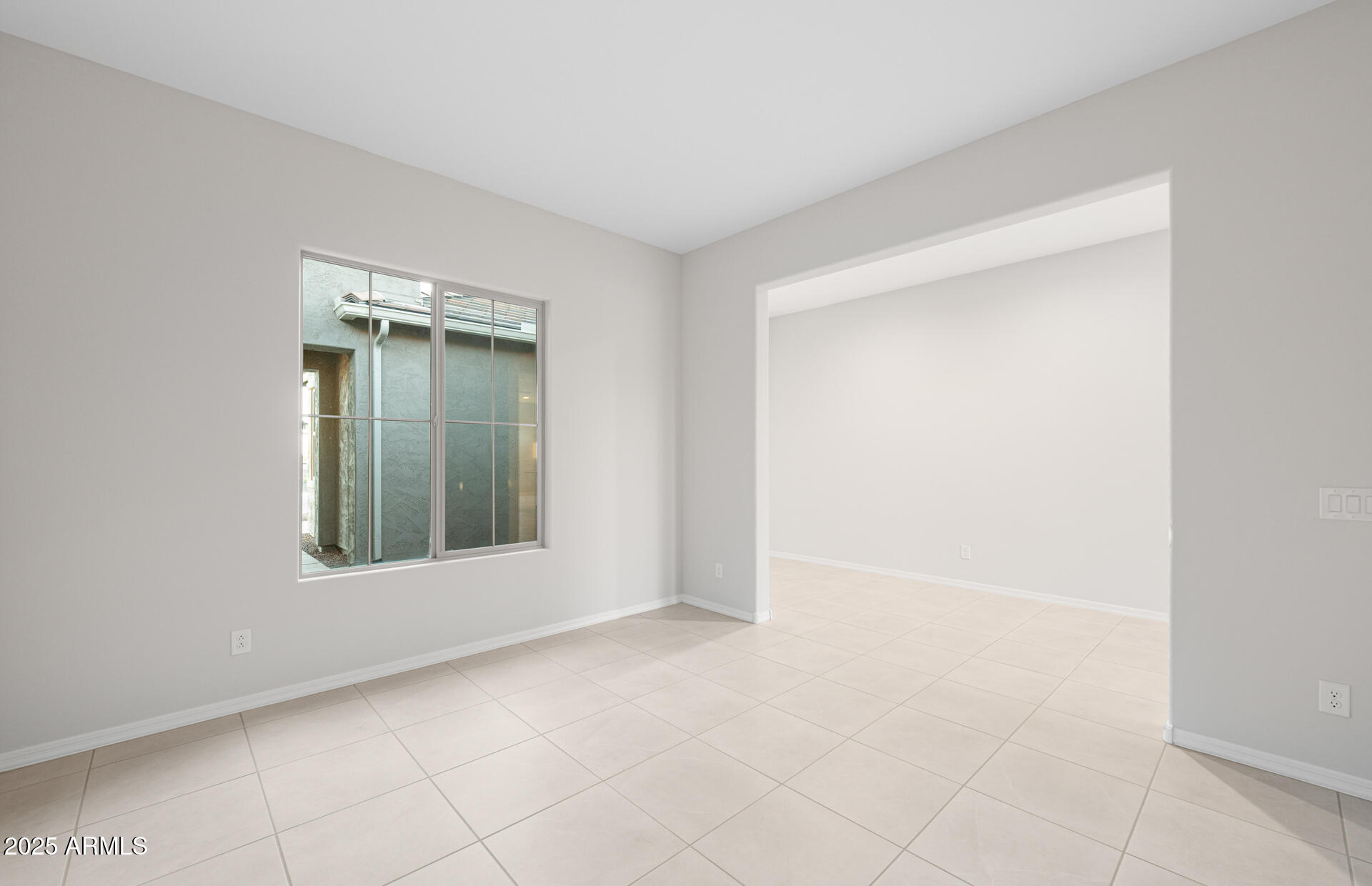 16170 West Red Bird Road Surprise, AZ 85387 - Photo 6 of 27 an empty room with windows and closet