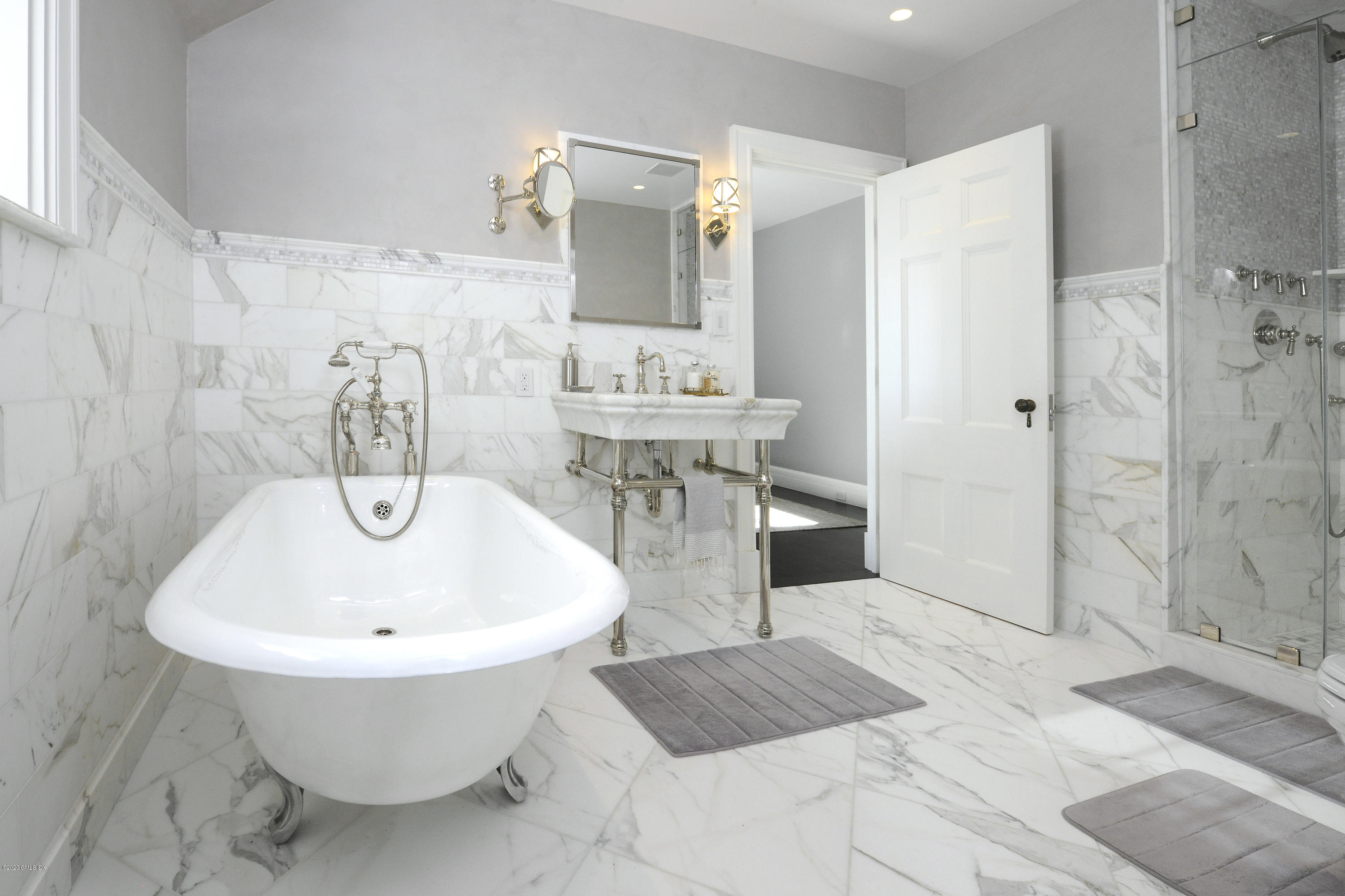 47 Carriglea Drive Riverside, CT 06878 - Photo 18 of 26 a bathroom with a sink and mirror