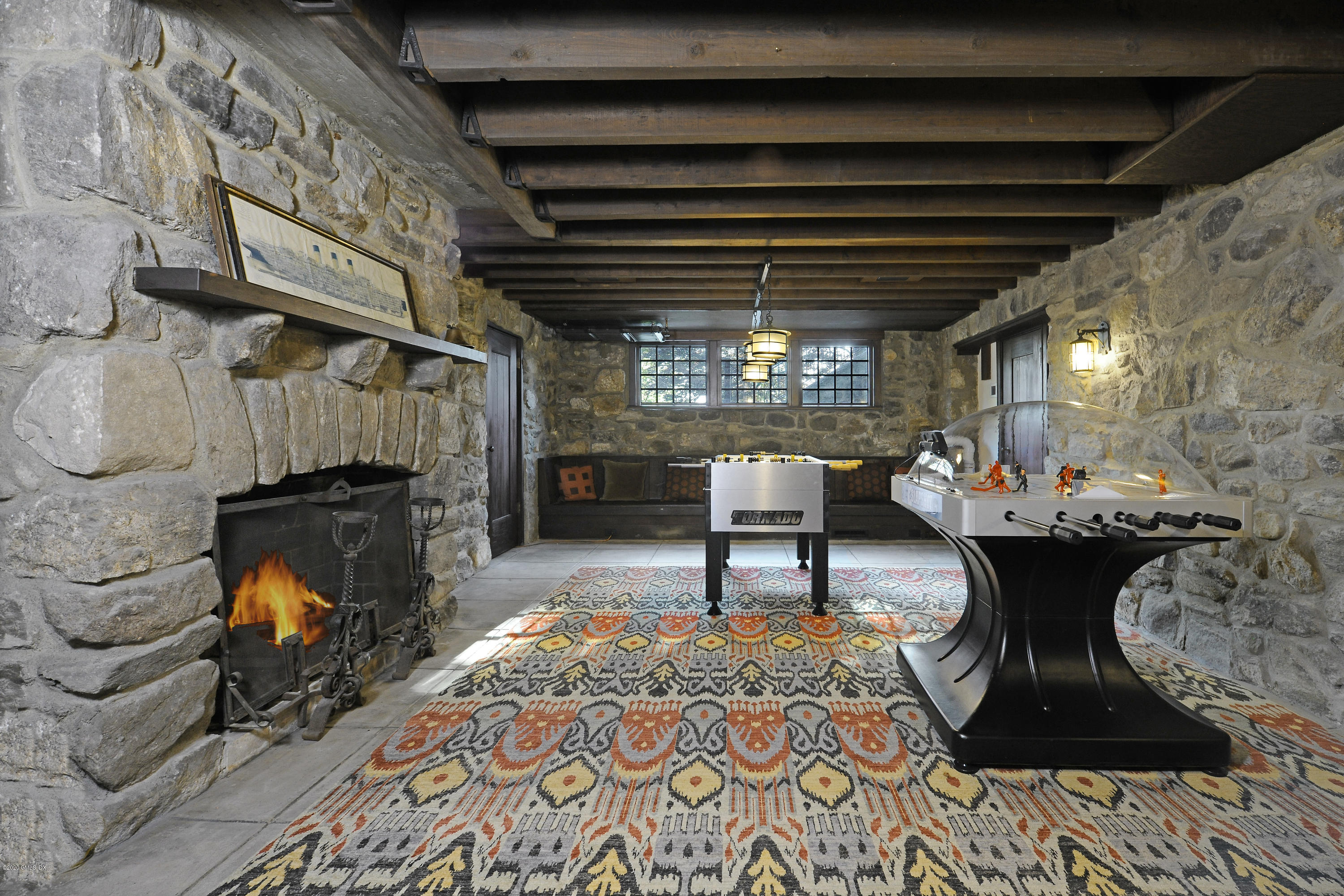 47 Carriglea Drive Riverside, CT 06878 - Photo 20 of 26 a living room with furniture and a fireplace