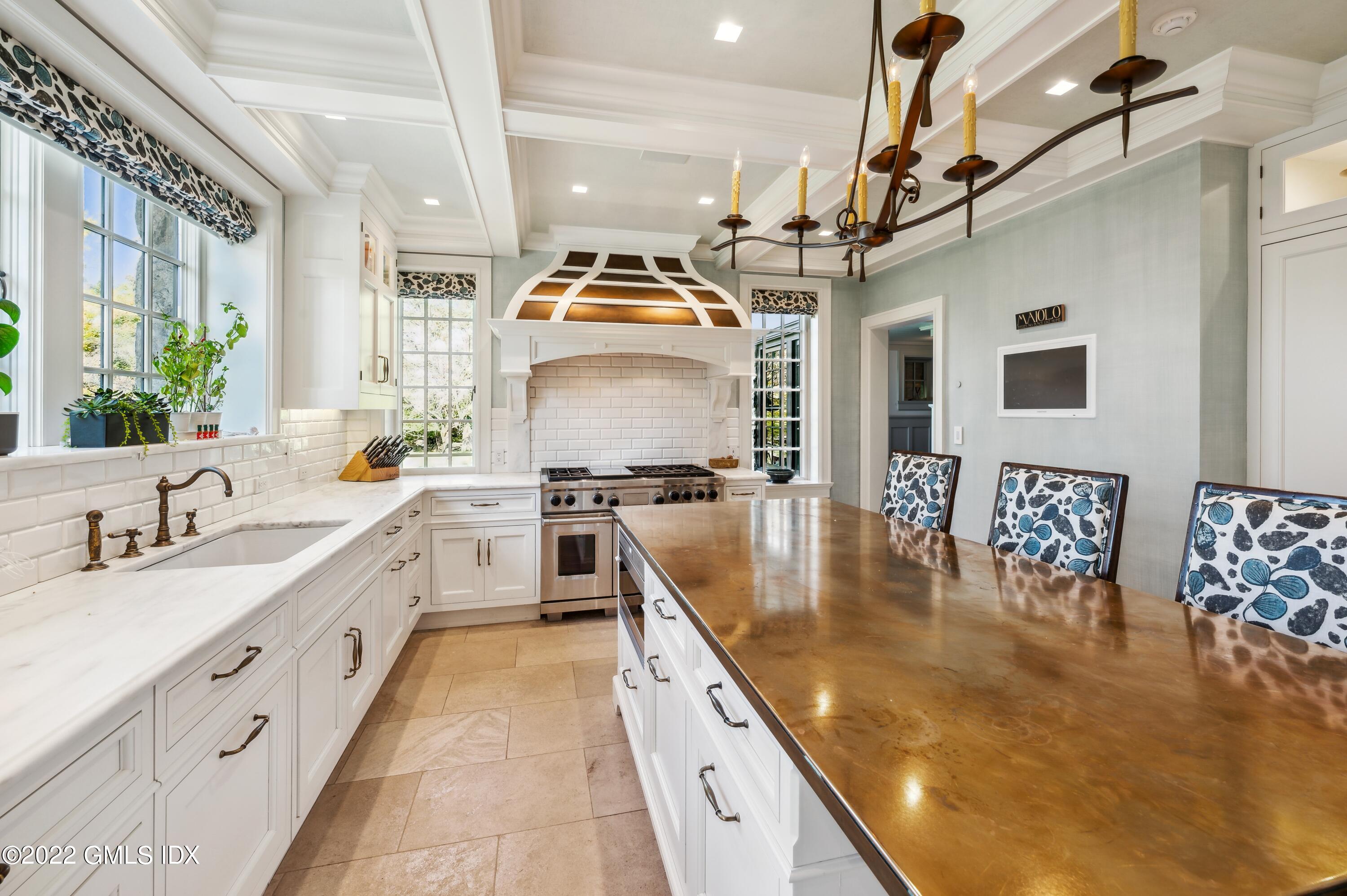 47 Carriglea Drive Riverside, CT 06878 - Photo 7 of 26 a large kitchen with stainless steel appliances granite countertop a lot of counter space