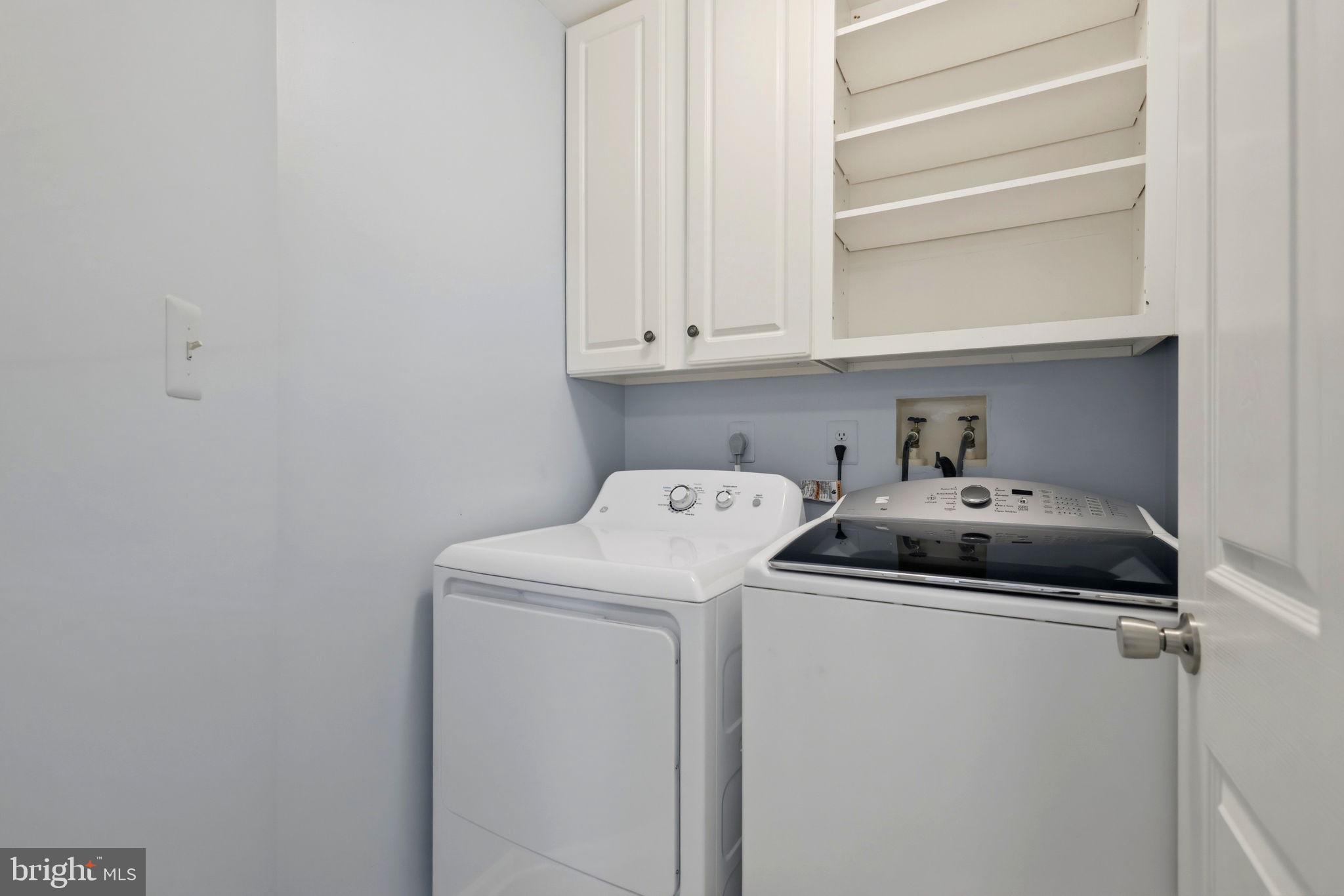 813 Duncan Place Southeast Leesburg, VA 20175 - Photo 56 of 90 Upper Level Laundry Room with Cabinets