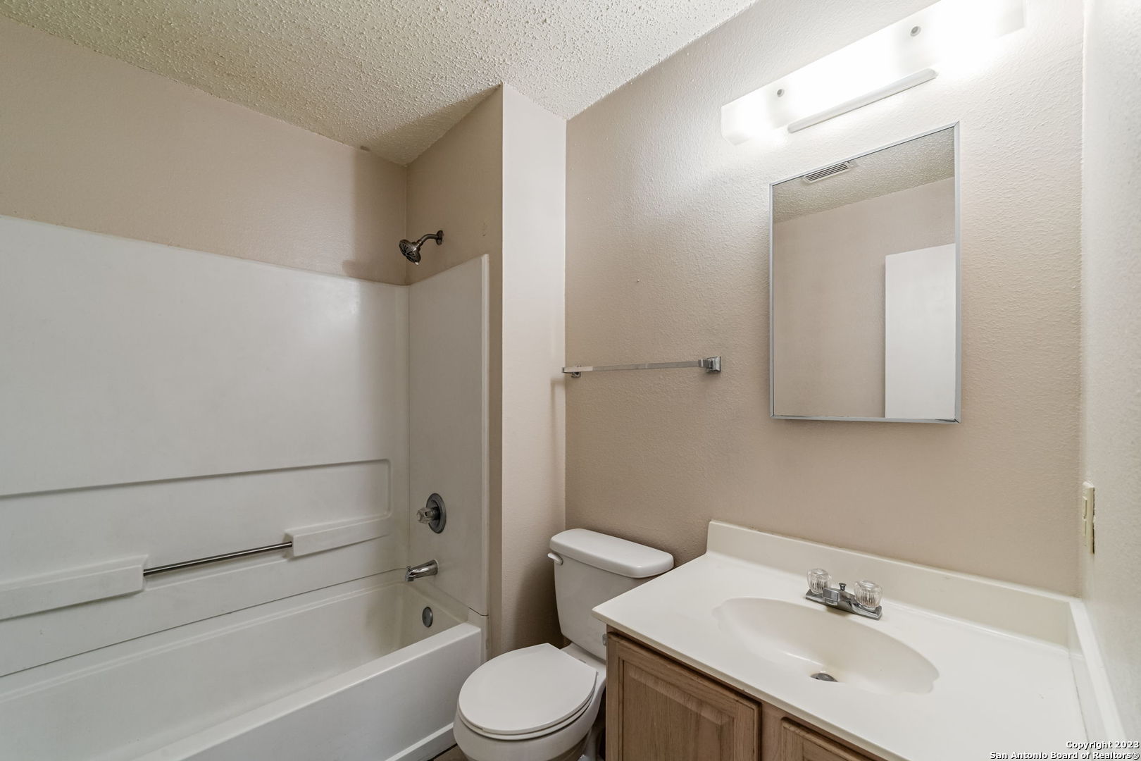 8422 Parry Path Converse, TX 78109 - Photo 14 of 36 a bathroom with a sink toilet and shower