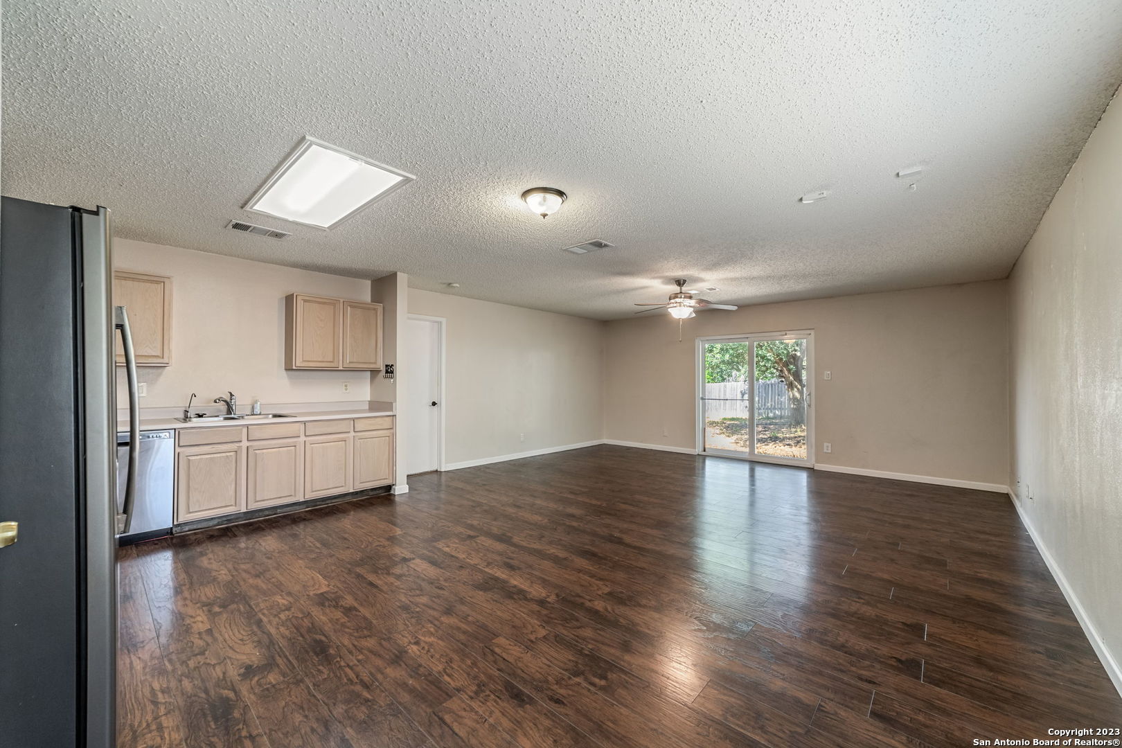 8422 Parry Path Converse, TX 78109 - Photo 16 of 36 a view of a kitchen with a sink and a stove top oven