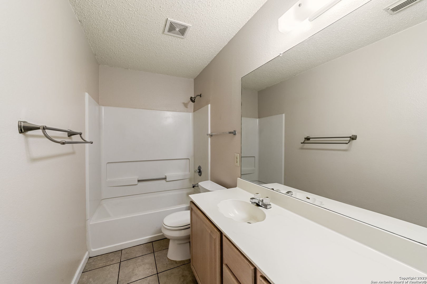 8422 Parry Path Converse, TX 78109 - Photo 26 of 36 a bathroom with a sink a toilet and shower
