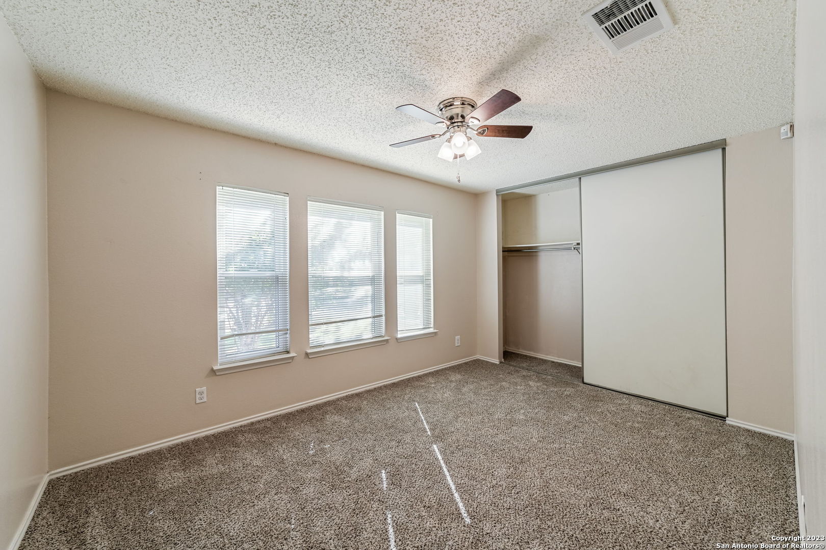 8422 Parry Path Converse, TX 78109 - Photo 7 of 36 a view of an empty room with a window