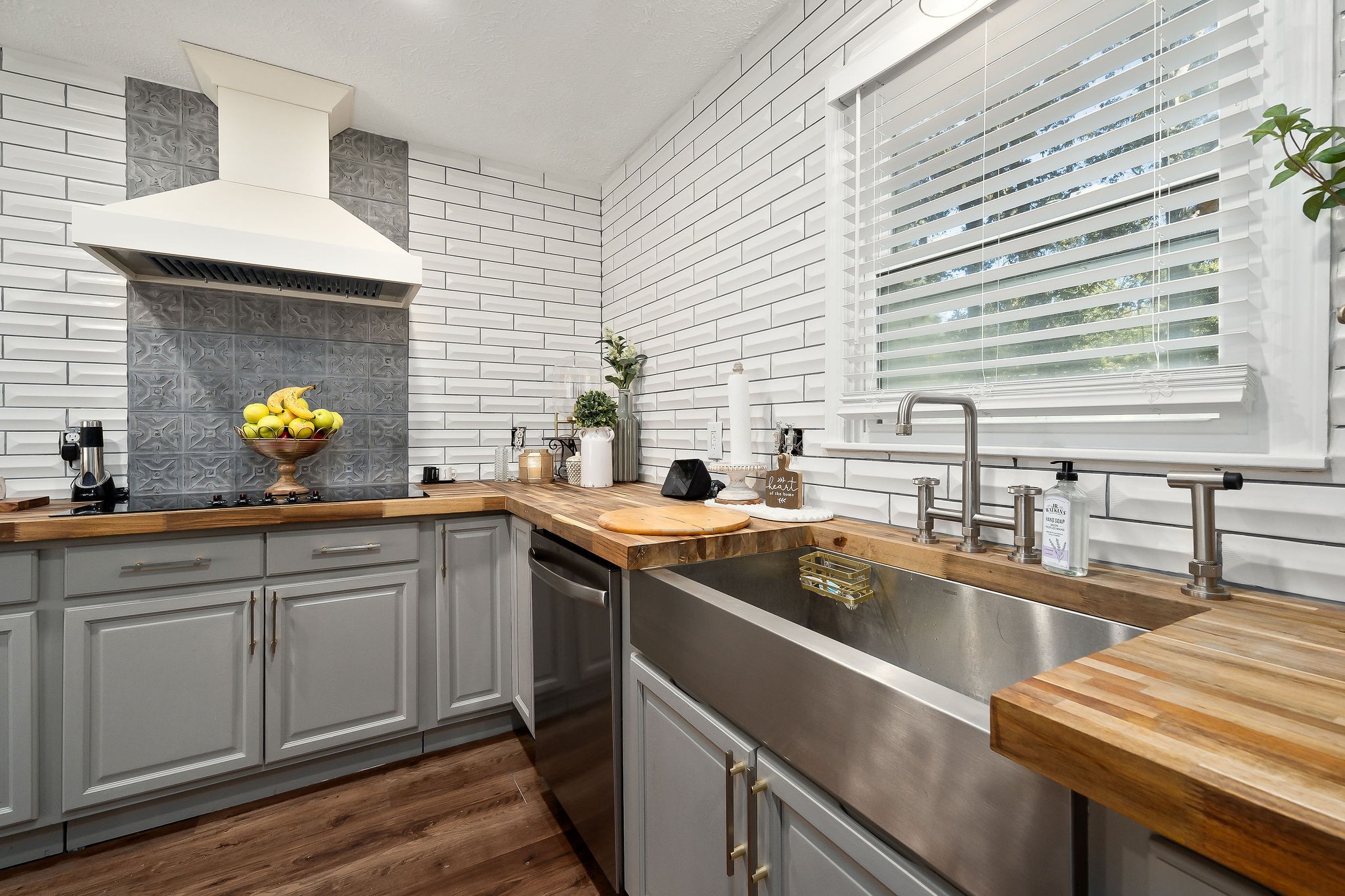 296 Big Rock Road Smithville, TN 37166 - Photo 12 of 32 a kitchen with a sink and a cabinets