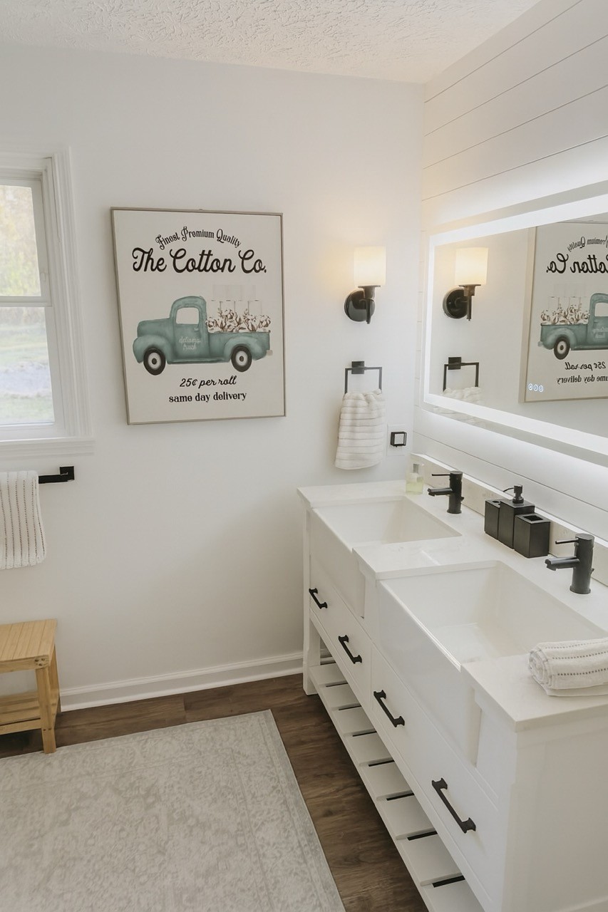 296 Big Rock Road Smithville, TN 37166 - Photo 27 of 32 a bathroom with a double vanity sink and a mirror