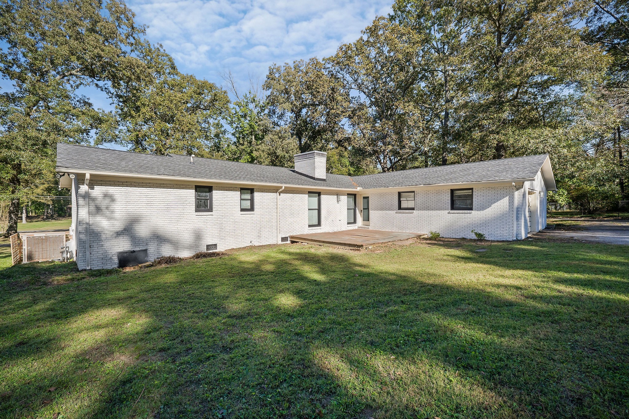 296 Big Rock Road Smithville, TN 37166 - Photo 28 of 32 a view of a house with a backyard