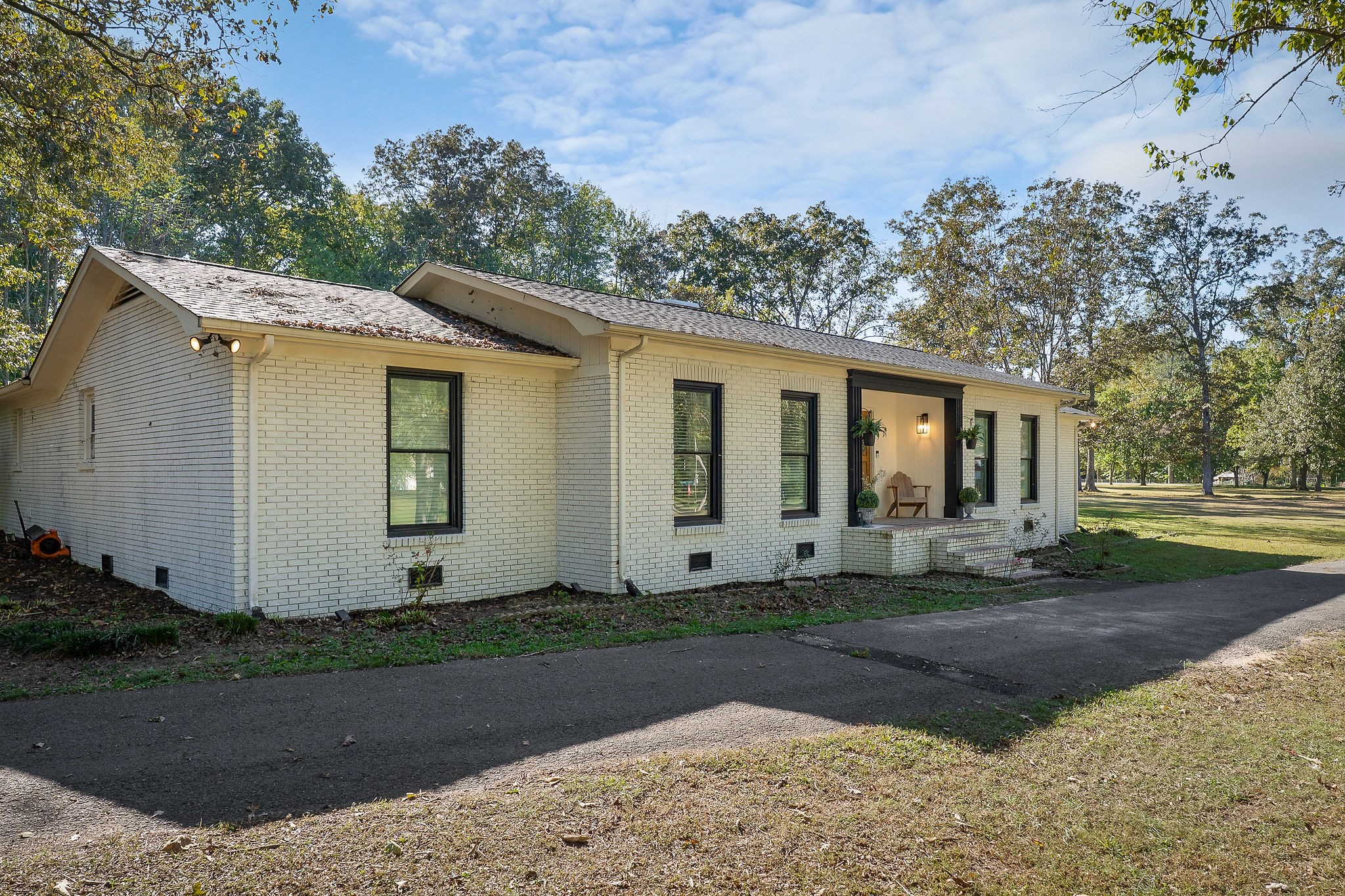 296 Big Rock Road Smithville, TN 37166 - Photo 3 of 32 a front view of a house with garden