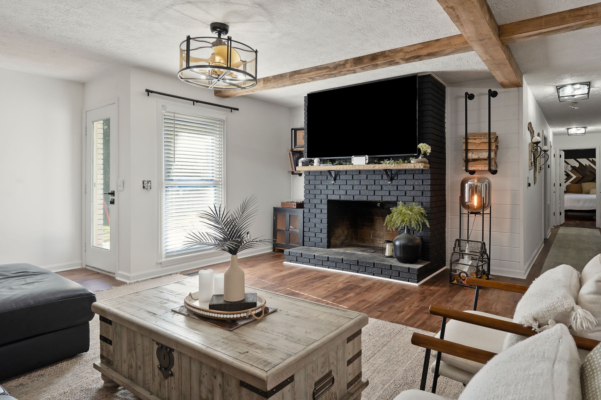 296 Big Rock Road Smithville, TN 37166 - Photo 7 of 32 a living room with furniture and a fireplace