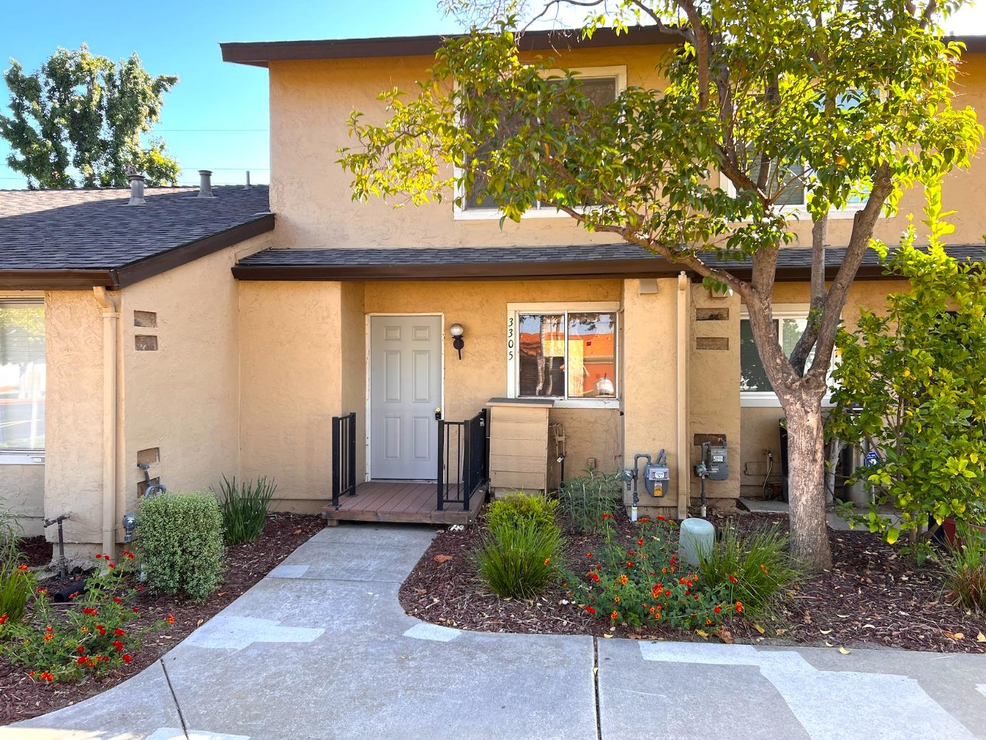 3305 Innerwick Lane San Jose, CA 95121 - Photo 2 of 19 a front view of a house with garden