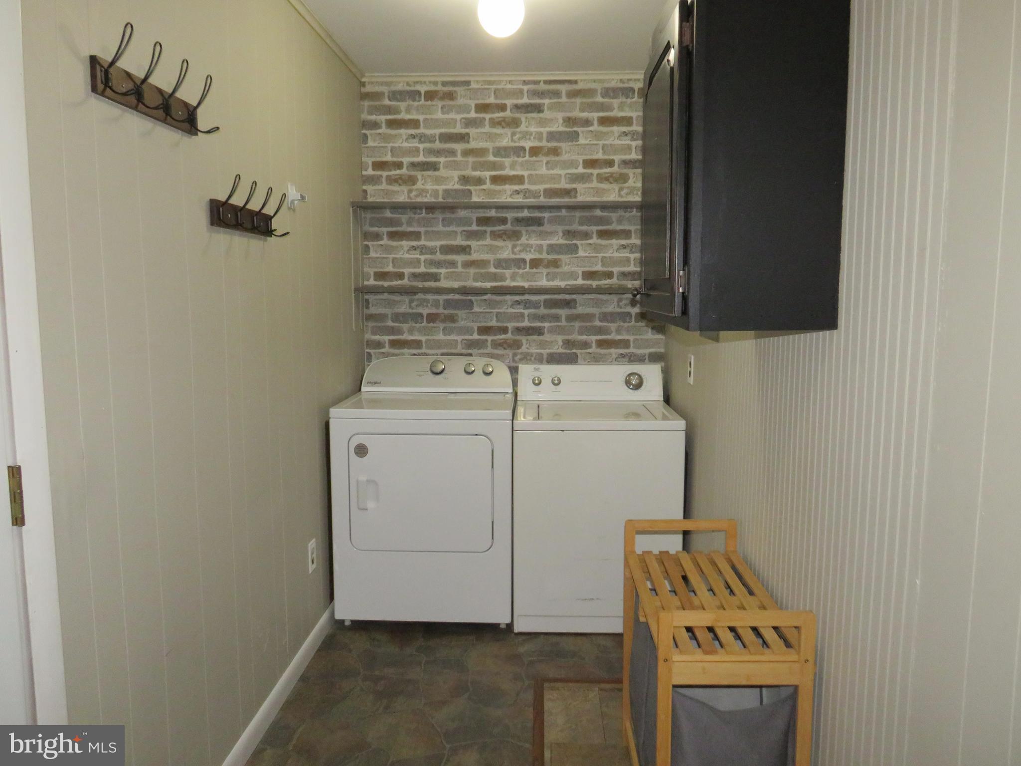 26419 Minden Avenue Crisfield, MD 21817 - Photo 11 of 31 a utility room with dryer and washer
