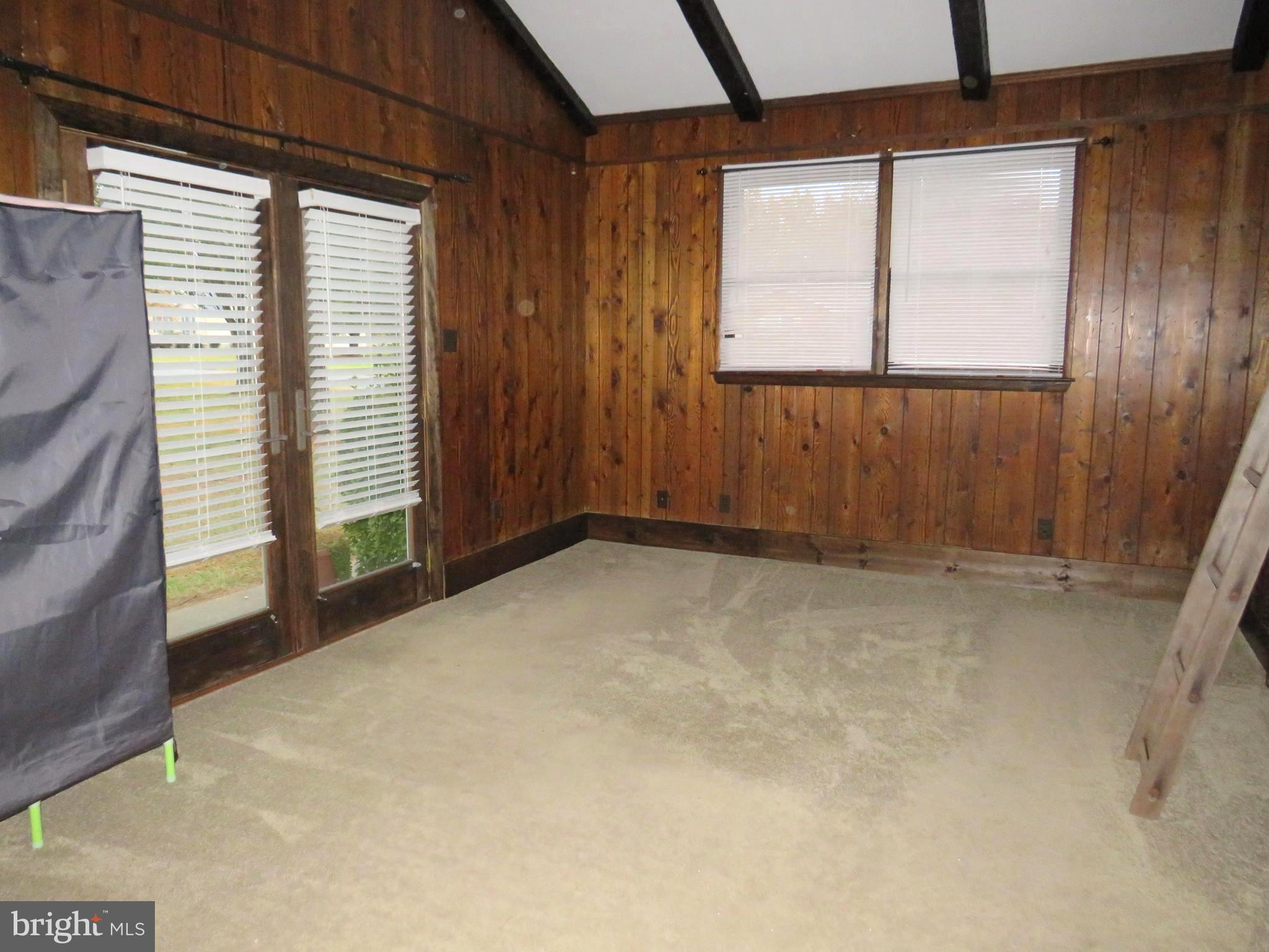 26419 Minden Avenue Crisfield, MD 21817 - Photo 22 of 31 an empty room with windows