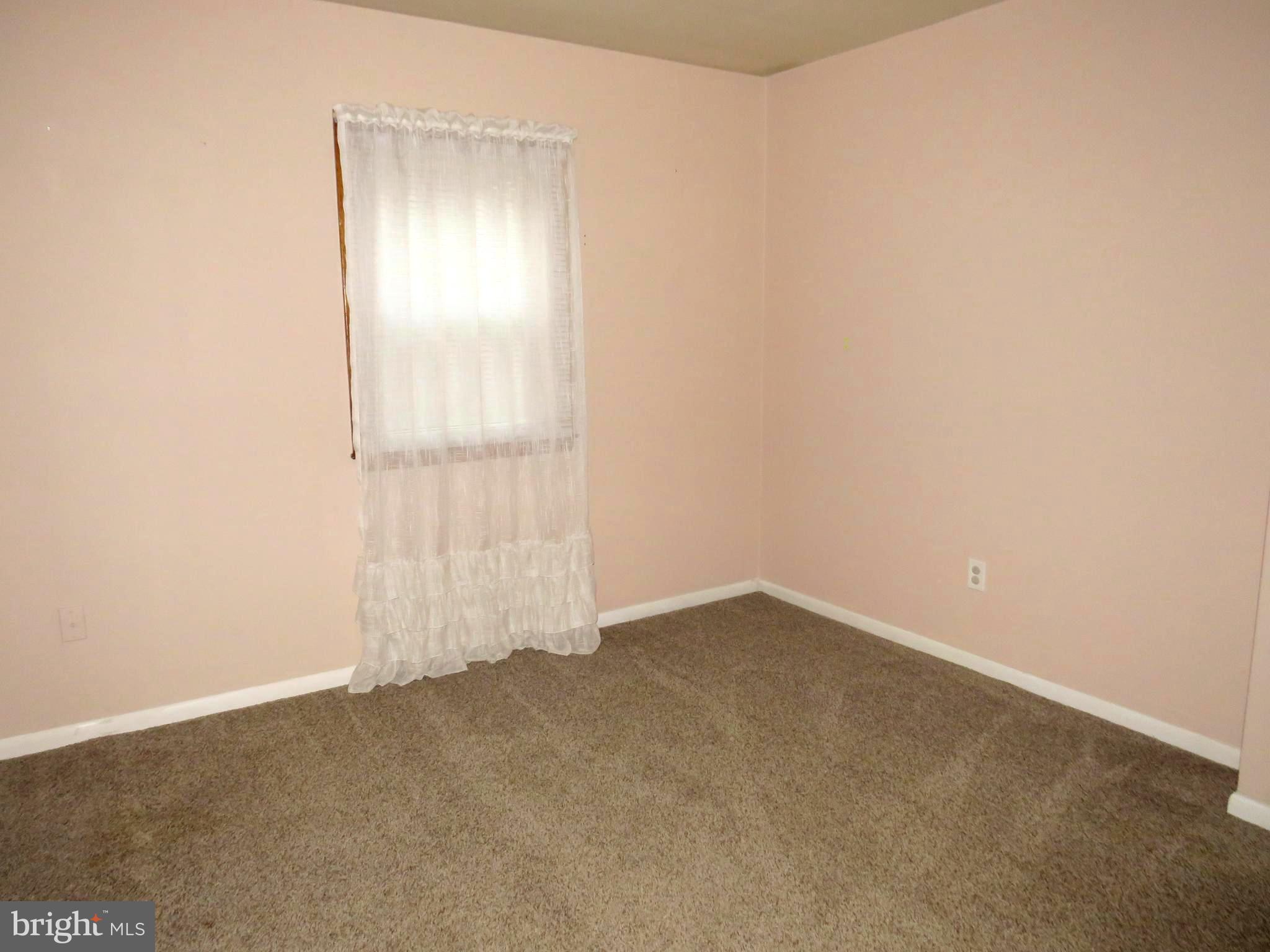 26419 Minden Avenue Crisfield, MD 21817 - Photo 28 of 31 an empty room with a empty space and a window