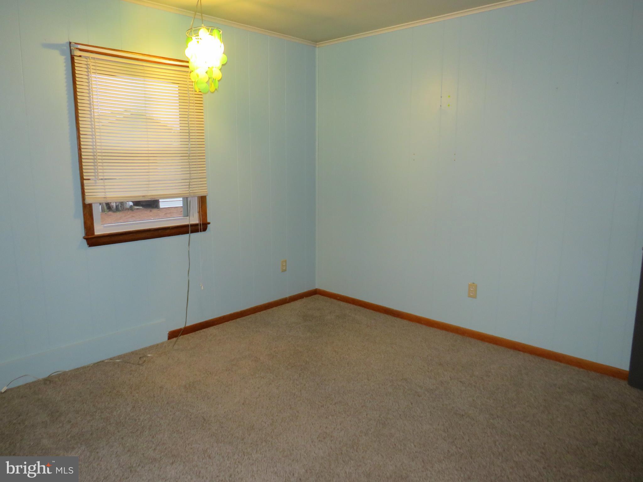 26419 Minden Avenue Crisfield, MD 21817 - Photo 31 of 31 an empty room with a window