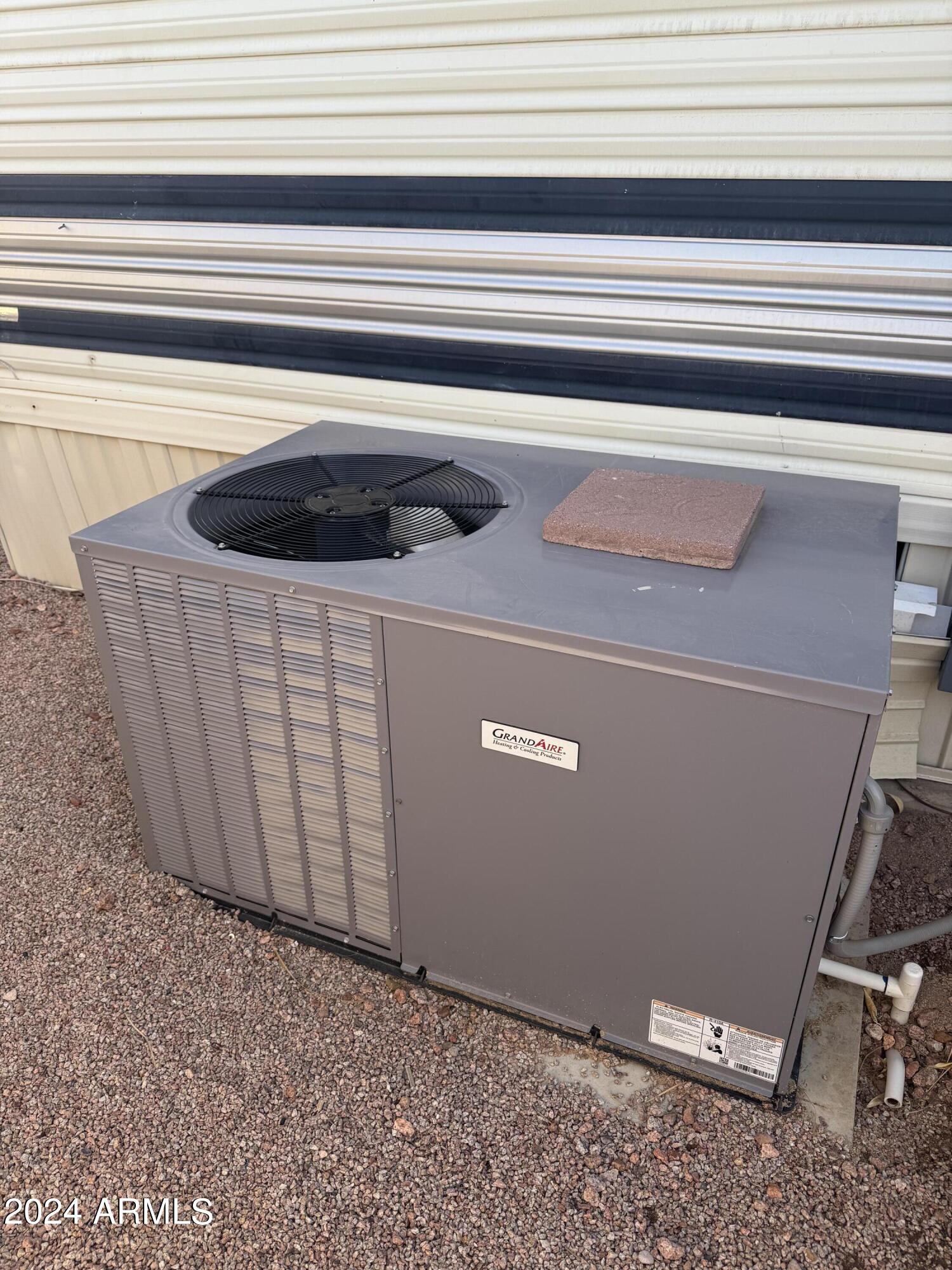 262 West Kiowa Circle Apache Junction, AZ 85119 - Photo 12 of 13 a view of a utility room with a window